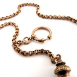A Victorian 9ct rose gold watch chain with pendant tasse
