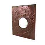 An Arts and Crafts copper mirror, Newlyn style