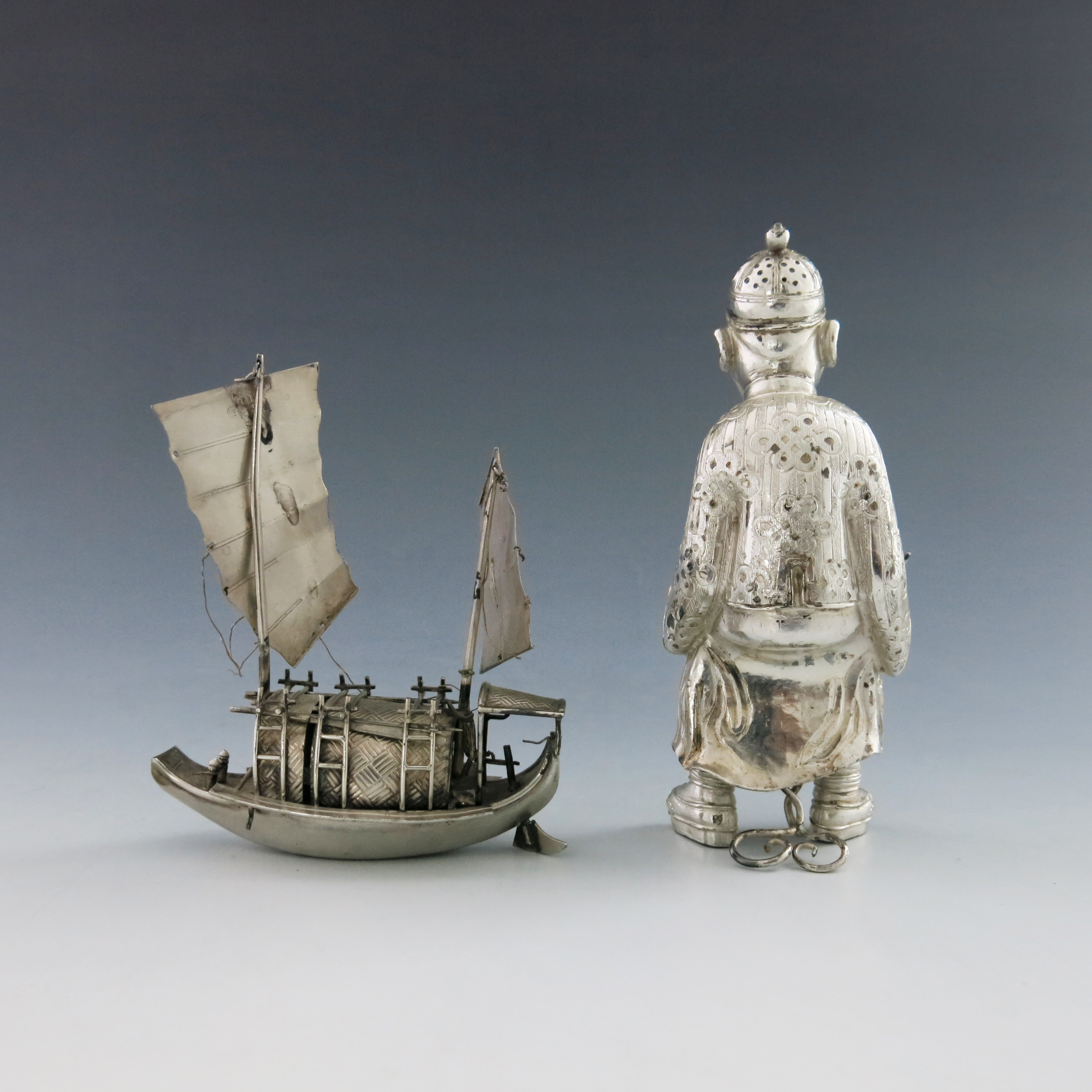 A novelty Chinese white metal condiment, early 20th Century, in the form of a seated Mandarin, - Image 4 of 5