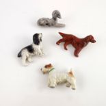 Four Royal Worcester dog brooches, 1932