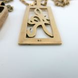 A 9ct yellow gold open work '1/2 oz' pendan