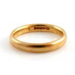 A 22ct yellow gold wedding band, 3.2gms