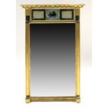 A Regency gilt framed pier glass, circa 1820, of Egyptian Revival design, ball cornice, painted