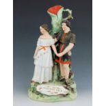 A Staffordshire figure group spill vase of Jenny Marston and Frederick Robinson as Perdita and Flori