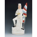A Staffordshire figure of King Richard the Lionheart, 19th Century, modelled standing with a flag, h