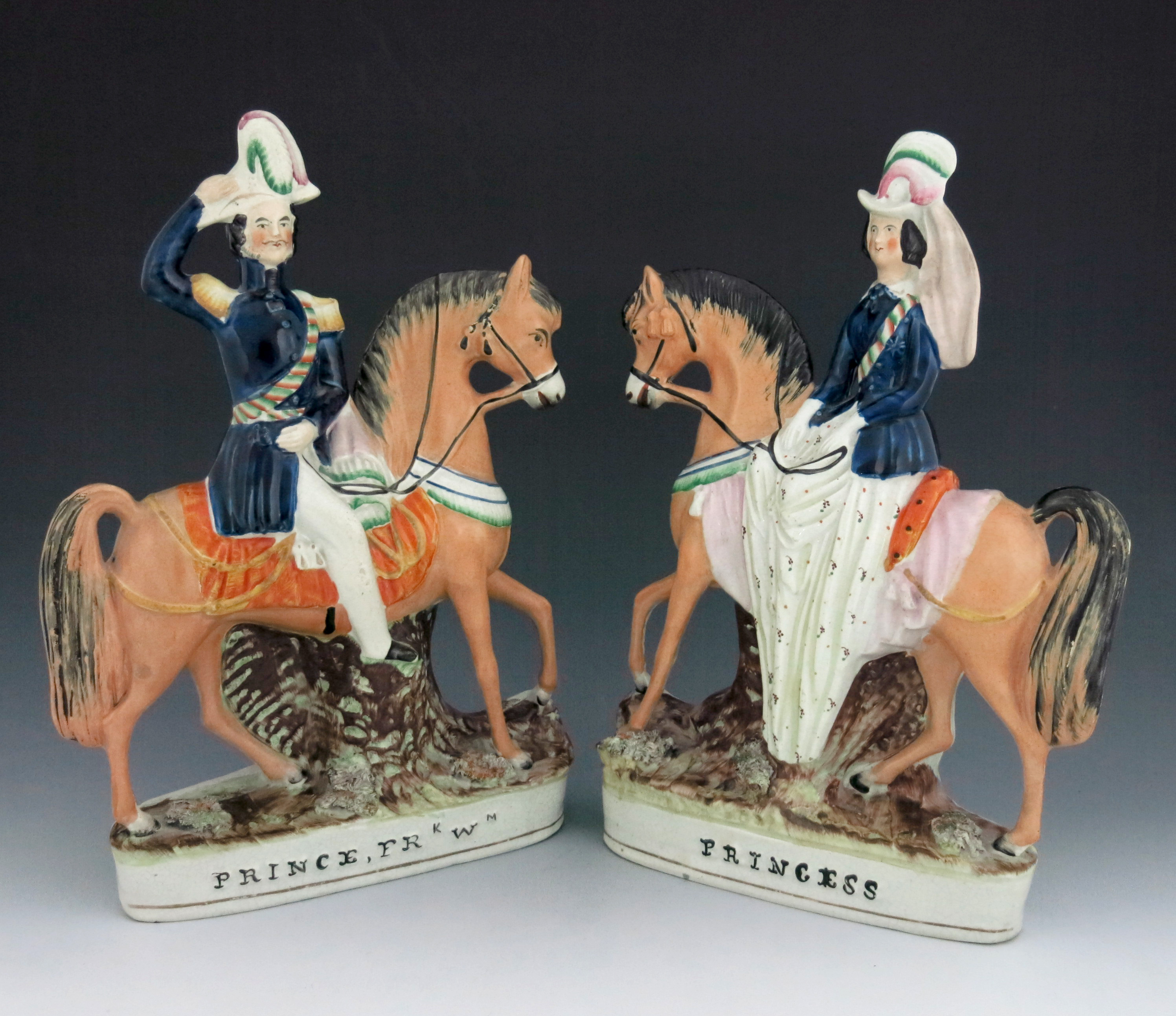 A pair of Staffordshire equestrian figures of Prince Frederick William of Prussia, and Victoria, Pri