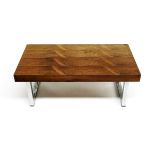 Gordon Russell, a rosewood veneered coffee table, circa 1970, rectangular top, chrome legs of square