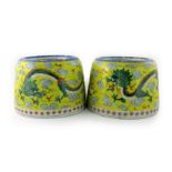 A pair of Chinese yellow ground planters, late 19th/early 20th Century, of tapered circular form