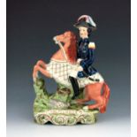 A Staffordshire Crimean War figure of 'General Pélissier', circa 1855, modelled on horseback, wearin