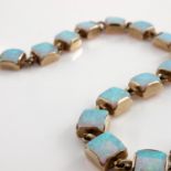 A 9ct gold and opal set bracelet