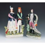 A Staffordshire figure group titled 'Highland Jessie', circa 1860, modelled as a soldier and a woman