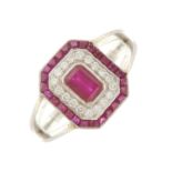 An 18ct gold ruby and diamond cluster dress ring