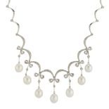 An 18ct gold cultured pearl and diamond fringe necklace