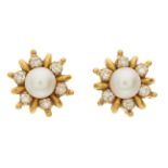 A pair of 22ct gold pearl and diamond stud earrings