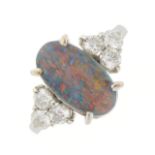 An 18ct gold black opal and diamond dress ring