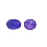 Two natural star sapphires