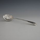 A Victorian silver soup ladle, George Adams, London