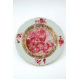 A Chinese Export side plate, famille rose decoration with a central scene titled