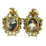 A pair of late 19th Century hard paste oval porcelain plaques, painted with a self portrait of