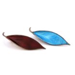 Willy Winnaess for David Andersen, two Norwegian silver gilt and enamelled leaf brooches, red and