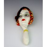 Royal Dux (attributed), an Art Deco mask hand mirror,