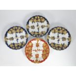 A set of three early 20th century Meissen relief moulded fruiting vine plates