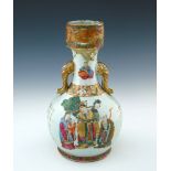 A 19th Century Chinese vase, cylindrical neck, gilt elephant trunk twin handles, the body painted