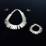 Alicia de la Paz Ortiz Cuevas, a Mexican Modernist silver necklace, bracelet and earring set