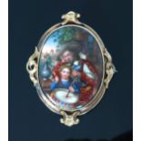 A late 19th Century hard paste porcelain brooch, painted with a tavern scene with Cavalier and boy