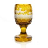 A Bohemian etched and engraved glass goblet