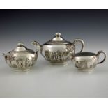 Frederick Elkington for Wedgwood, an electroplated encased three piece tea set