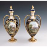 A pair of Davenport scene painted vases and covers