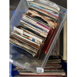 A quantity of vinyls, mostly 33RPM and 45RPM, clas