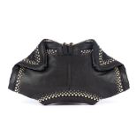 Alexander McQueen, a studded De Manta clutch