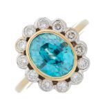 An 18ct gold blue zircon and diamond cluster ring