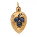 A late 19th century gold, sapphire and diamond egg charm pendant