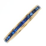 An 18ct gold sapphire full eternity ring