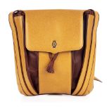 Cartier, a Must De Cartier mustard drawstring handbag