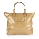 Anya Hindmarch, a beige patent leather handbag