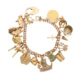 A 9ct gold curb-link charm bracelet, with heart-shape padlock clasp