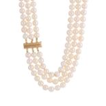 A three-row cultured pearl choker necklace, with 14ct gold clasp
