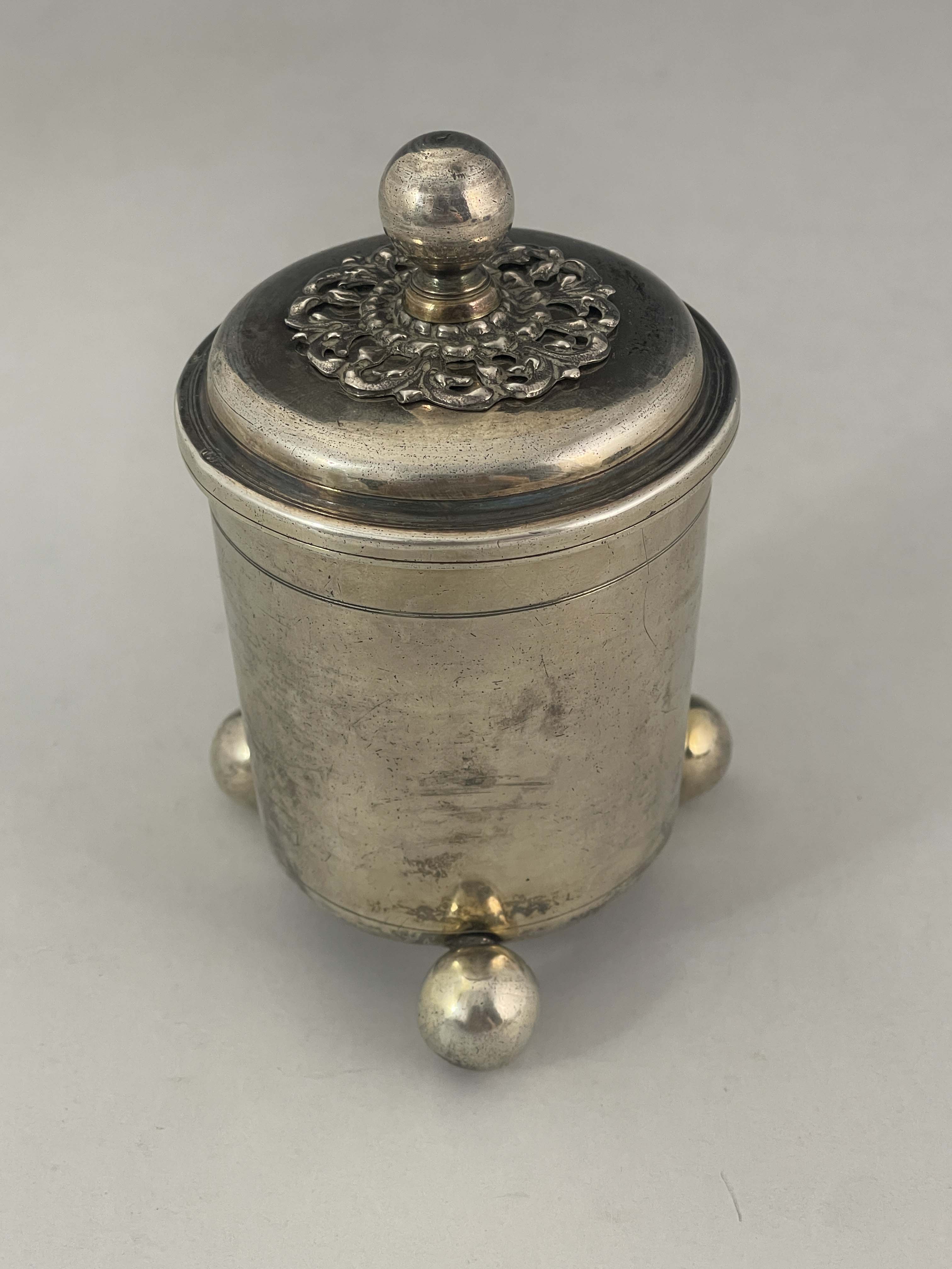 A German silver gilt cup and cover, Augsburg circa 1680, beaker form, on three ball feet with ball - Image 3 of 8