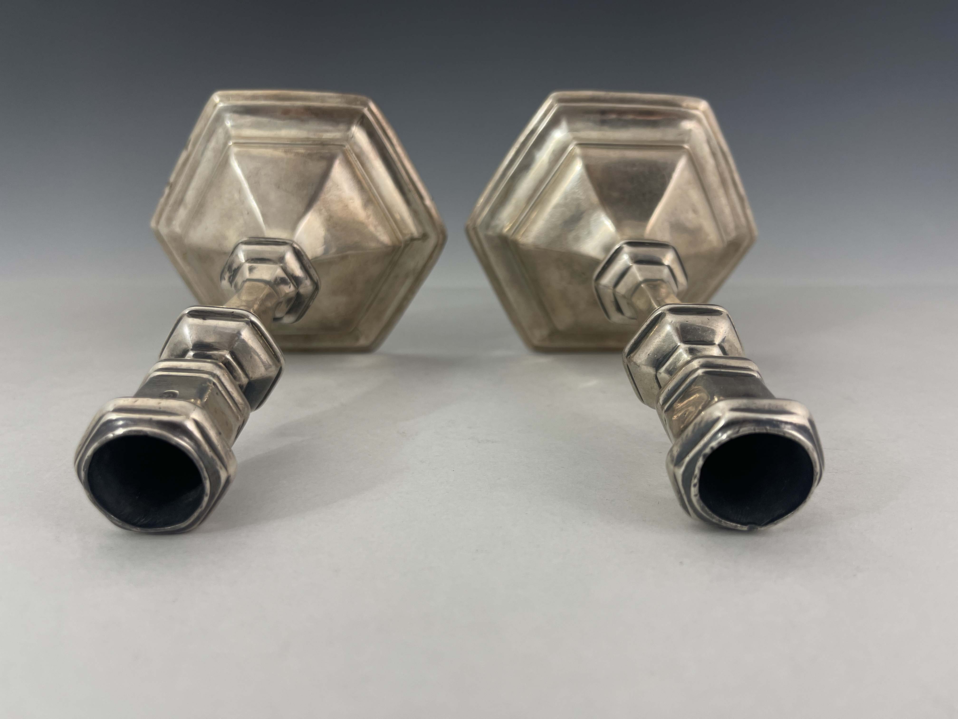 A pair of George I silver candlesticks, Matthew Cooper, London 1718, hexagonal form, on stepped - Image 5 of 6