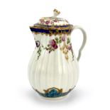 A Worcester polychrome milk jug and lid