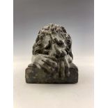 An Italian green marble model of a Medici lion, late 19th Century, modelled recumbent on a plinth,