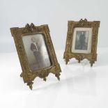 A pair of Victorian gilt metal photograph frames, foliate design with ribbon surmount, splayed legs,