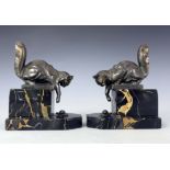 Hippolyte Moreau, a pair of Art Deco patinated art metal figural bookends