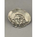 A Victorian silver embossed pin dish