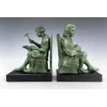 Max Le Verrier, Cobbler and Financier, a pair of Art Deco patinated art metal bookends,