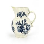 A Worcester blue and white cabbage leaf moulded mask jug